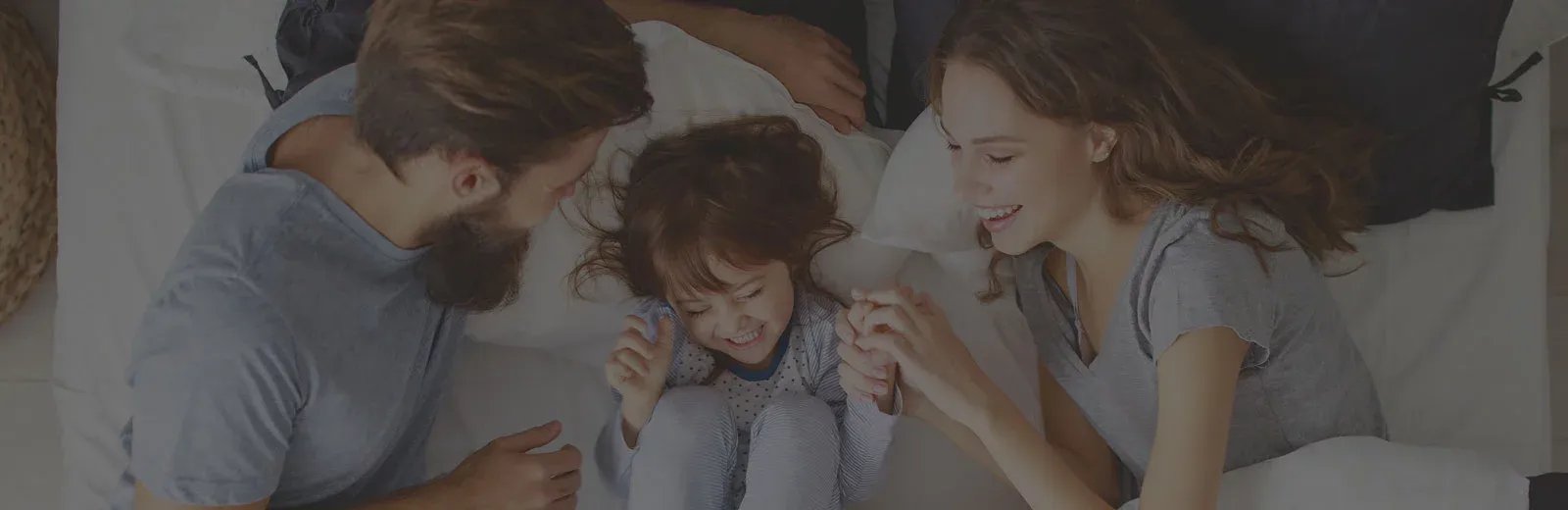 family laughing tickling each other